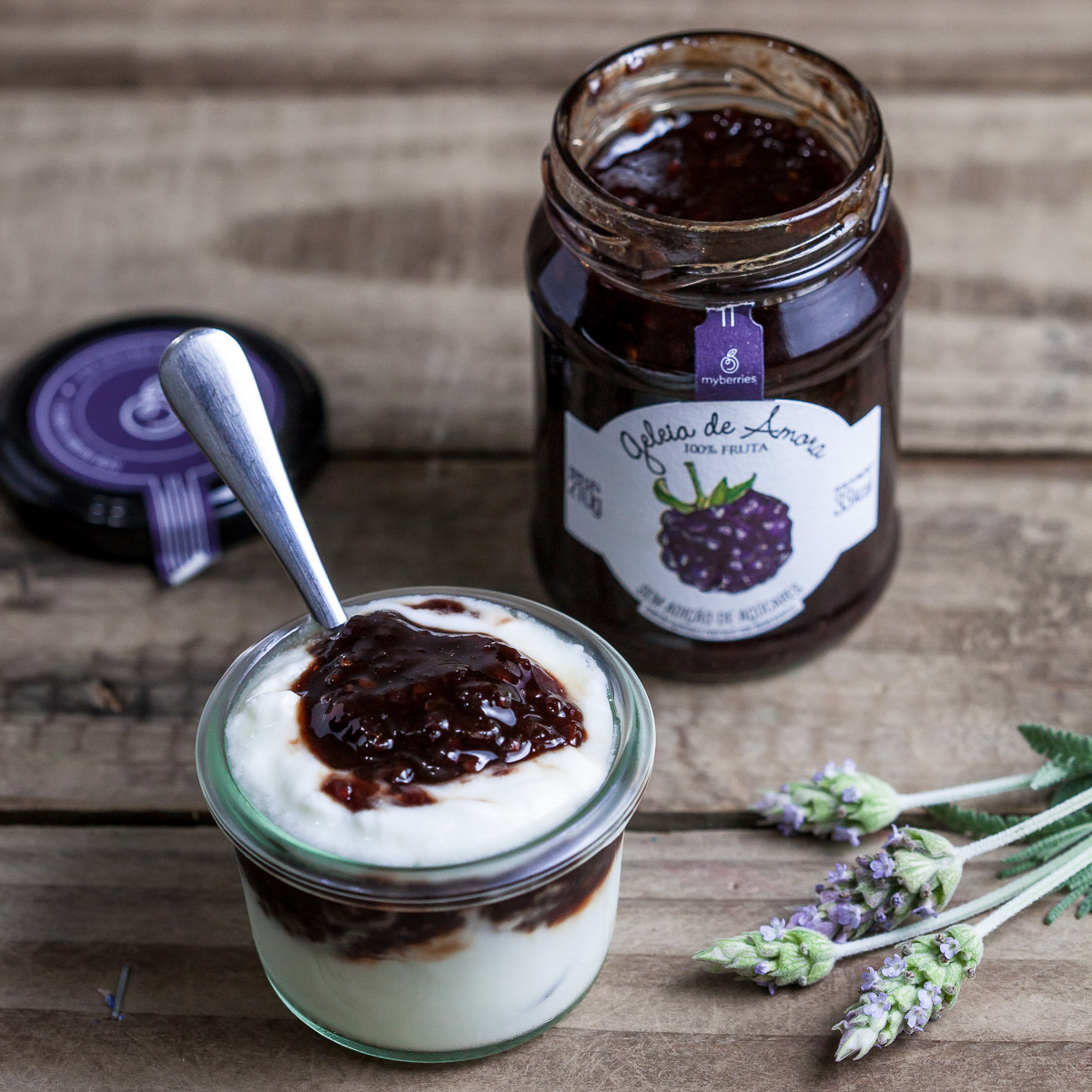 Food photo with yogurt and blueberru jam, decorated with lavander